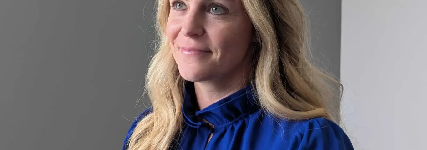 Headshot of Caitlyn Collins, associate professor of sociology at Washington University.